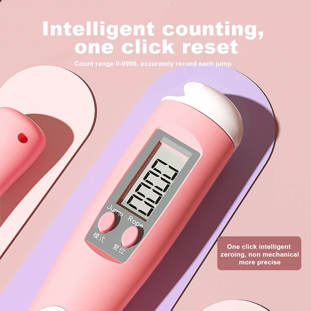 Close-up view of digital counter on pink smart jump rope